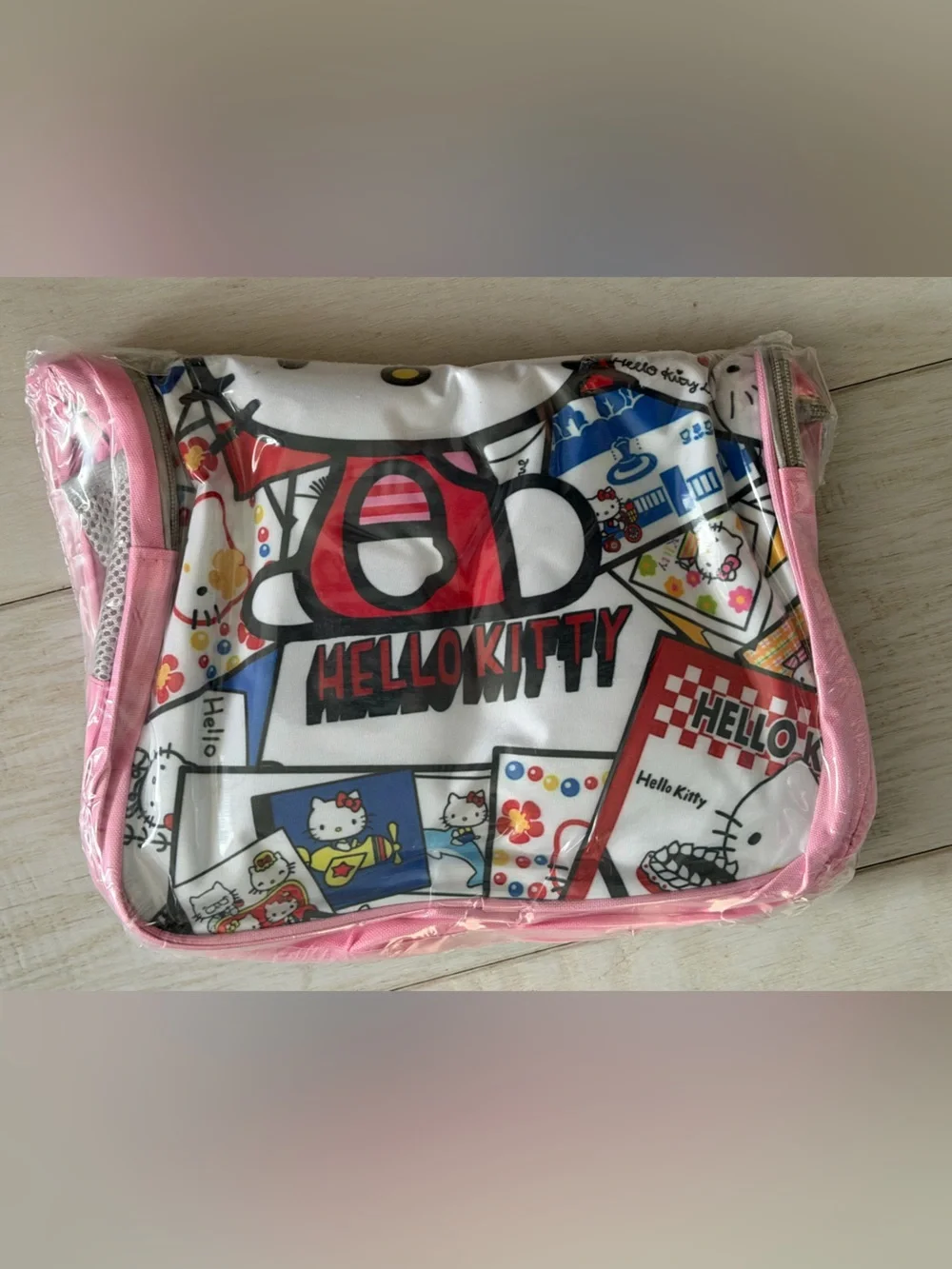 NEDISP Hello Kitty White Comic Collage Kids BOOKSACK with Pink/Gray Trim